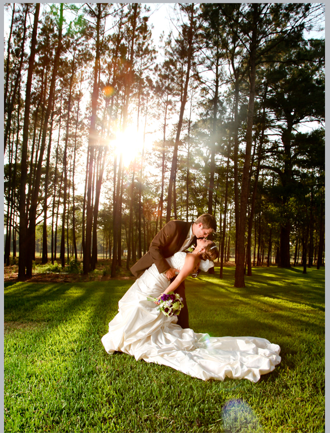 Bride and Groom Kiss in the Woods by Pedigo Photography