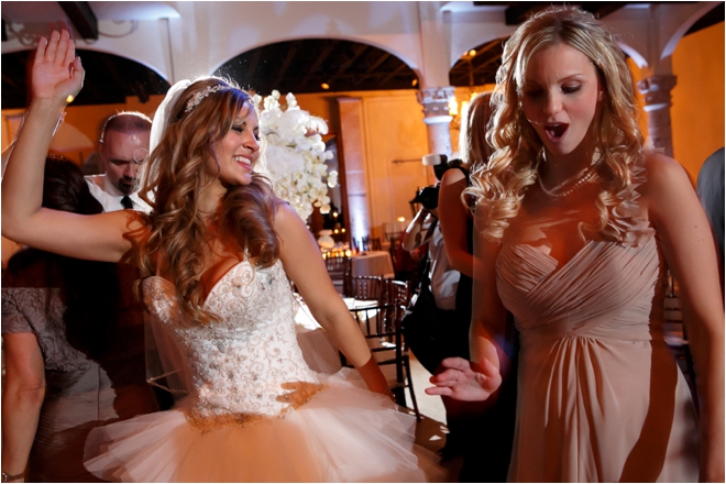 Bride and bridesmaid dancing