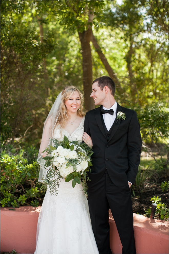 ashton gardens wedding bride groom portrait white rose greenery bouquet