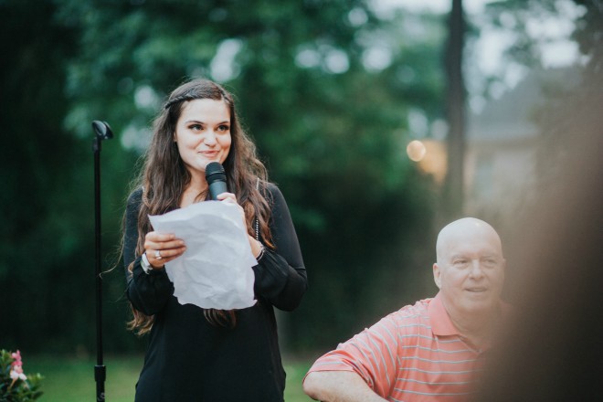 Maid of honor giving rehearsal dinner speech