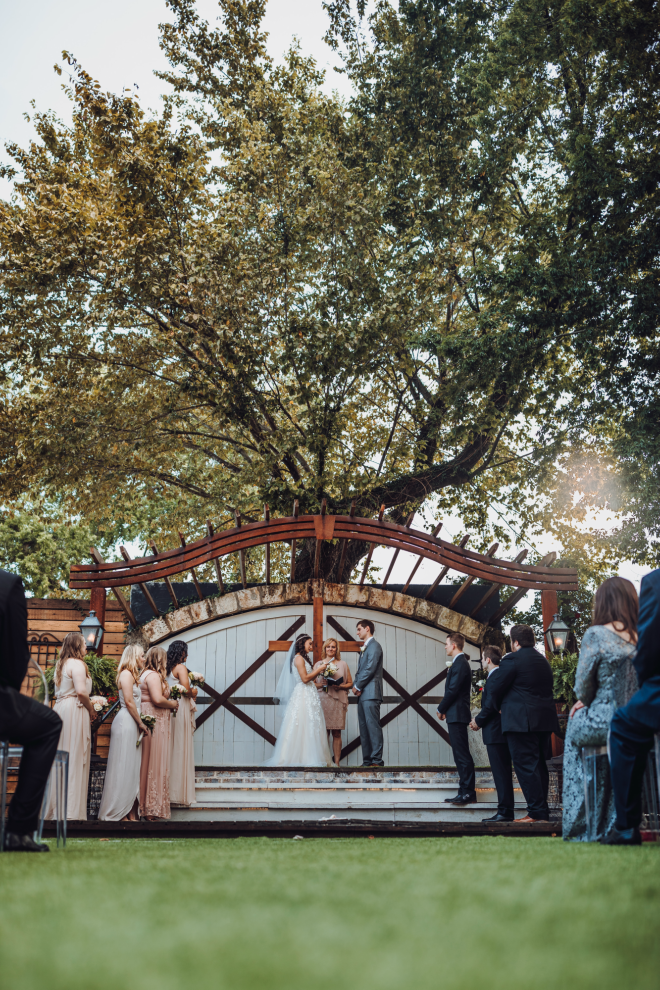 wedding ceremony at Hughes Manor