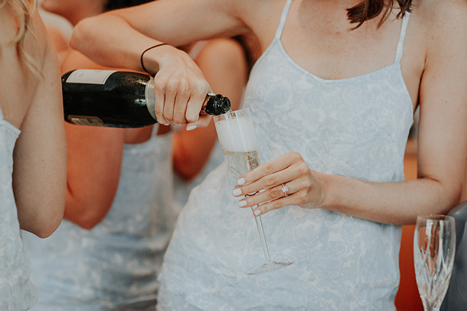 real wedding houston wedding the woodlands resort & conference center bridesmaids getting ready champagne toast diamond wedding ring