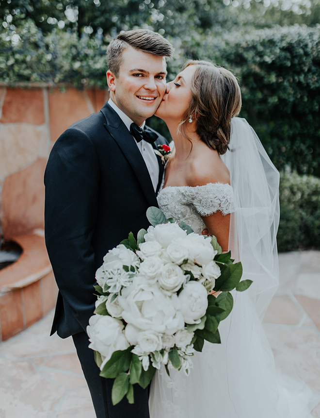 real wedding houston wedding the woodlands resort & conference center bride and groom bridal photography outdoor garden husband wife white rosese bridal bouqet outdoor stone fountain