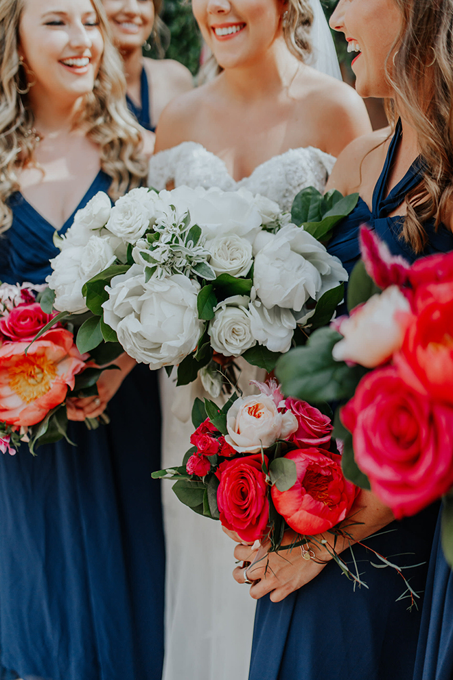 real wedding houston wedding the woodlands resort & conference center bridal bouquet white roses hot pink roses bridesmaids bouquets bridal party