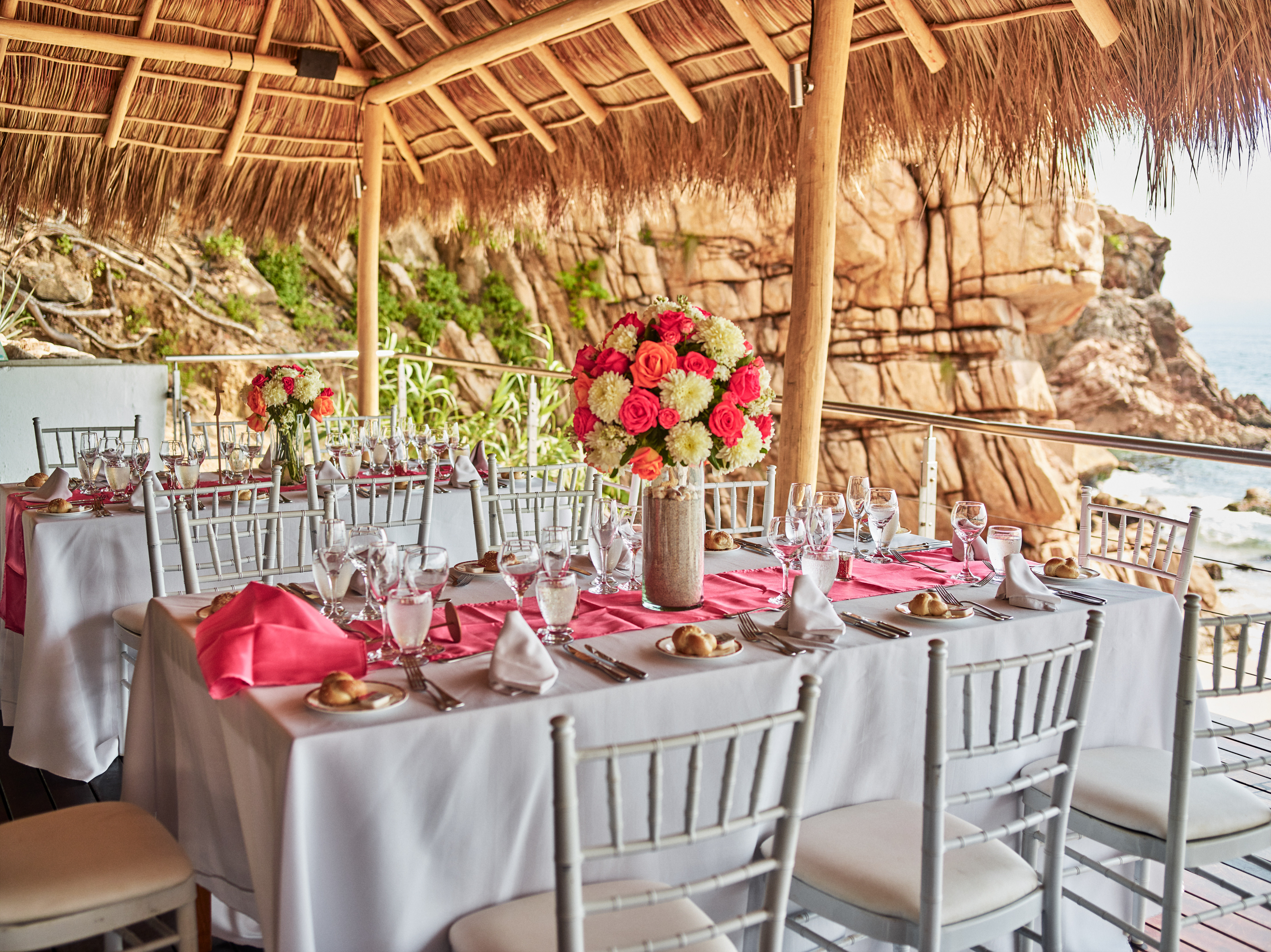 beach destination wedding, Mexico, Puerto Vallarta, summer wedding, reception table decor, beach front wedding reception, coral and white floral centerpieces