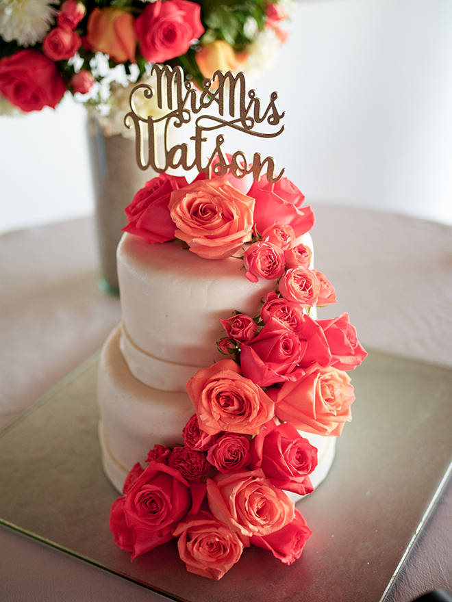 beach destination wedding, Mexico, Puerto Vallarta, summer wedding, wedding cake with flower topping, white two-tiered cake, coral flowers