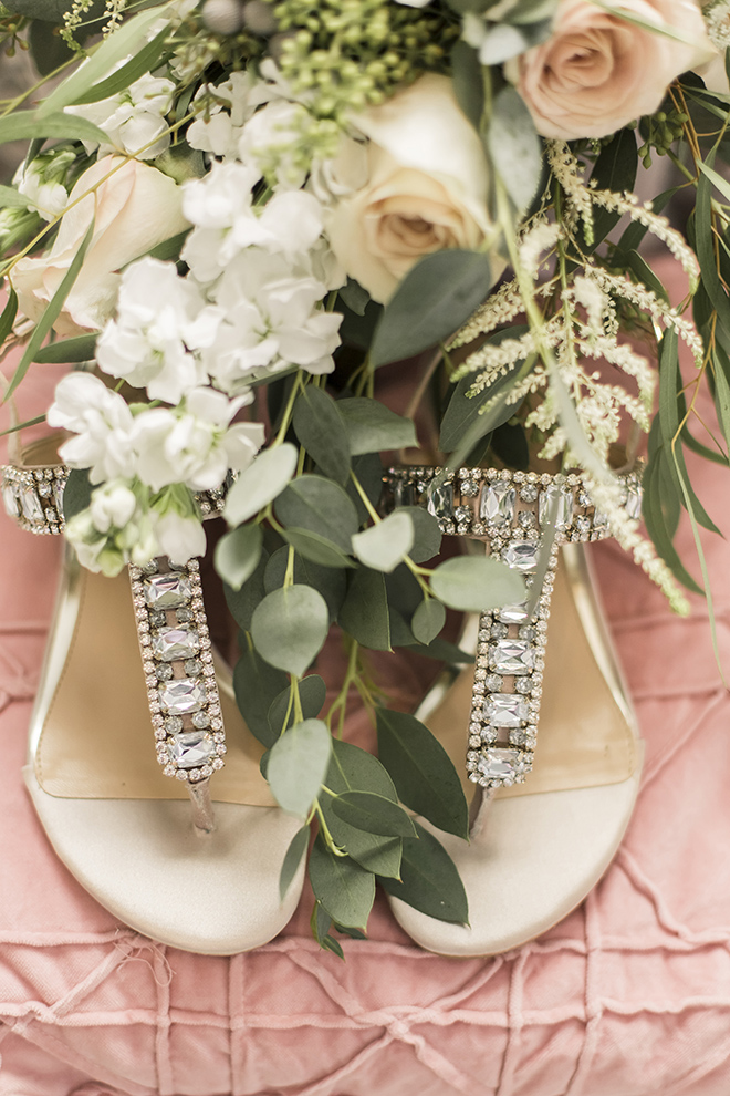 vintage haute flowers wedding details flat lay crystal sandals roses ferns butler's courtyard