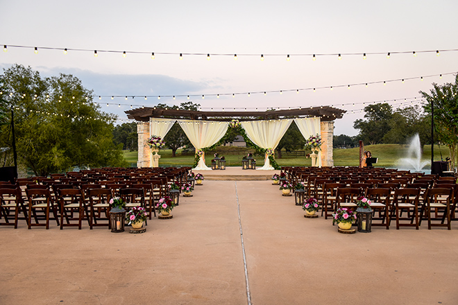 rustic autumn wedding, briscoe manor, kiss and makeup houston, outdoor wedding ceremony, string lights, harp player, lanterns