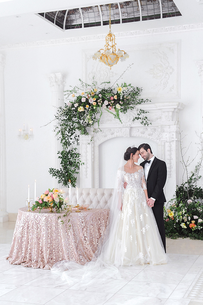 royal wedding inspired shoot, chateau cocomar, jessica frey photography, spring florals, regal wedding decor, white lace wedding gown, wedding tiara, wedding bouquet, white marble, houston wedding venue