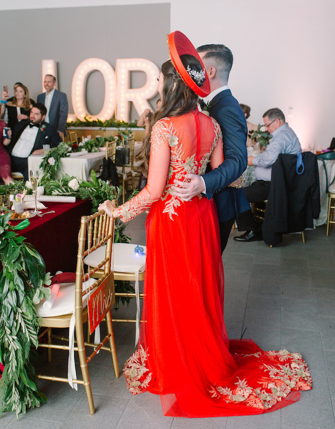 reception entertainment, marquee letters, Vietnamese dress, red