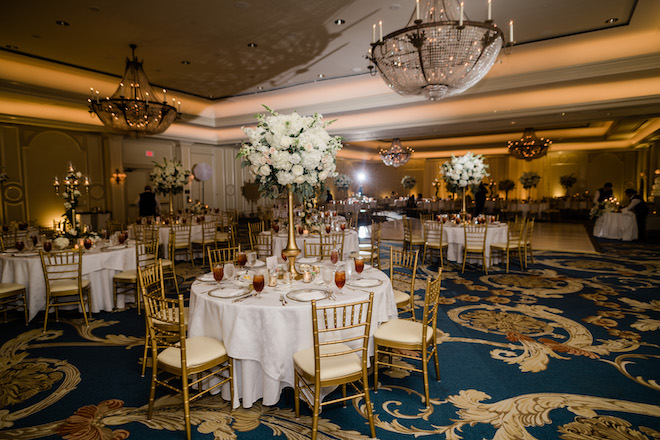 reception decor, floral centerpieces, dramatic, lush, white, gold, chandeliers, venue, houstonian hotel