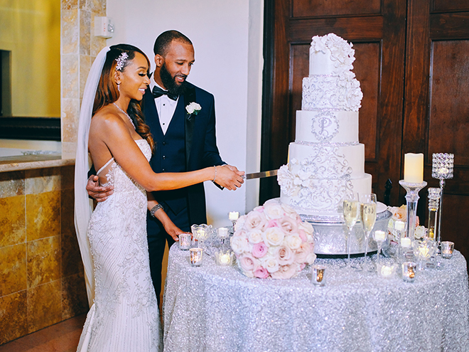 cutting the cake, reception entertainment, wedding moments, civic photos, wedding cake, classic, timeless, white, floral, silver, 5-tier