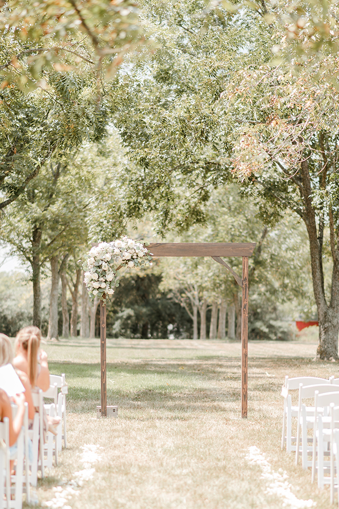 outdoor ceremony, bridal bouquet, bride, groom, estates at pecan park, white, grey, timeless, simple, wooden altar