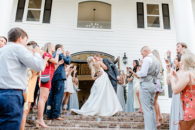 sendoff, grand exit, bubbles, day time, estates at pecan park, amy maddox photography