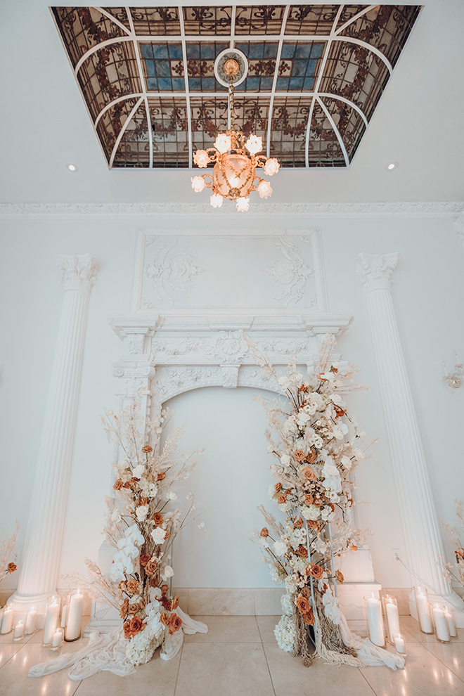 ceremony decor, french venue, modern wedding, floral arch, roses, ivory, white, neutral, terracotta, color palette