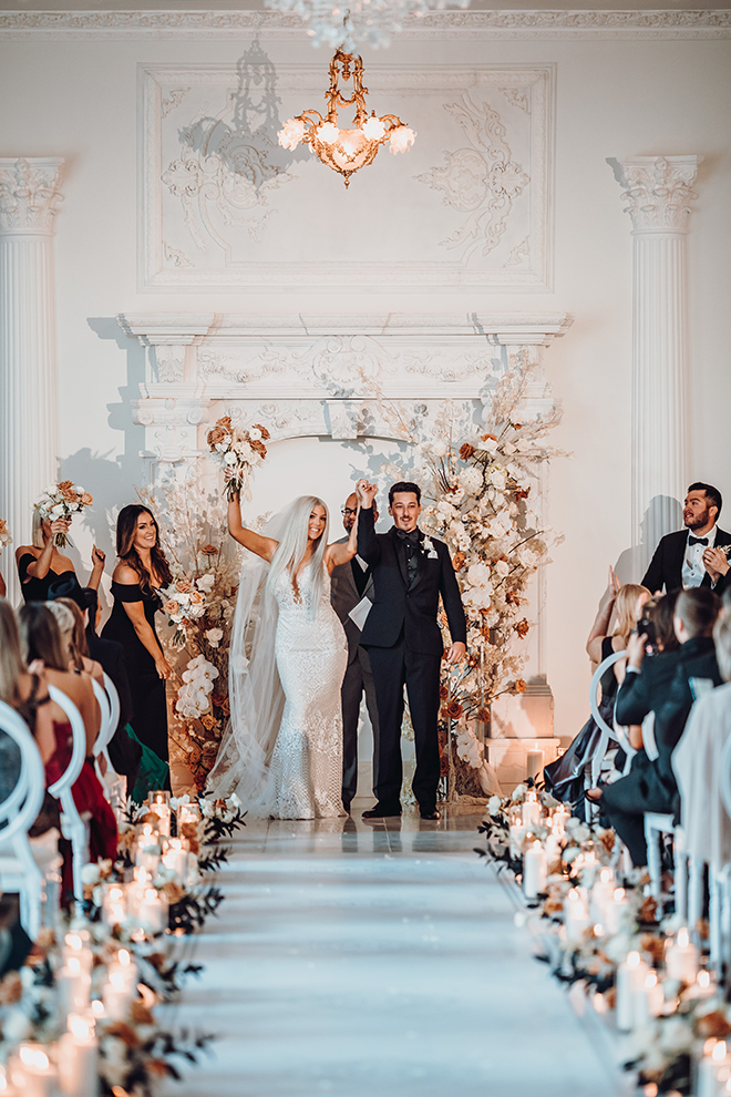 ceremony decor, french venue, modern wedding, floral arch, roses, ivory, white, neutral, terracotta, color palette