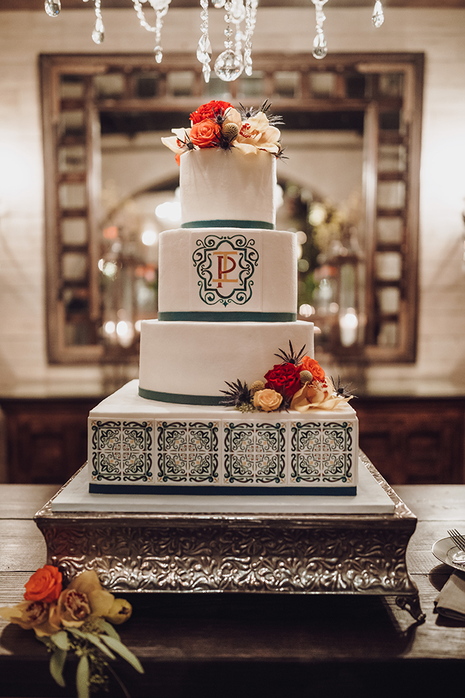 wedding cake, blue, white, flower accents, four tier, spanish tile, monogrammed, unique