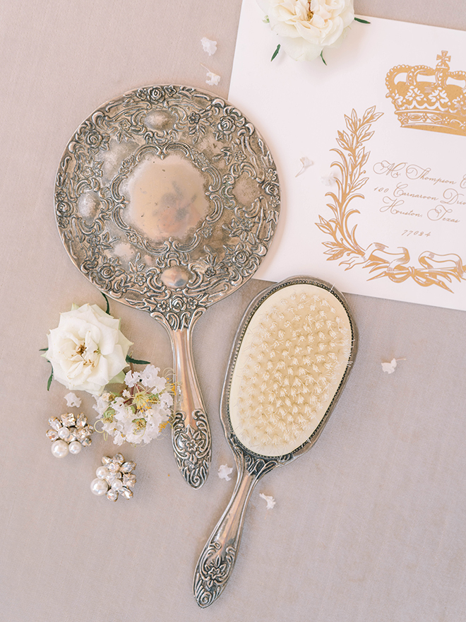 something gold, brush, mirror, victorian, silver, luxury, flat lay, ivory, roses, cluster earrings, pearls, diamonds