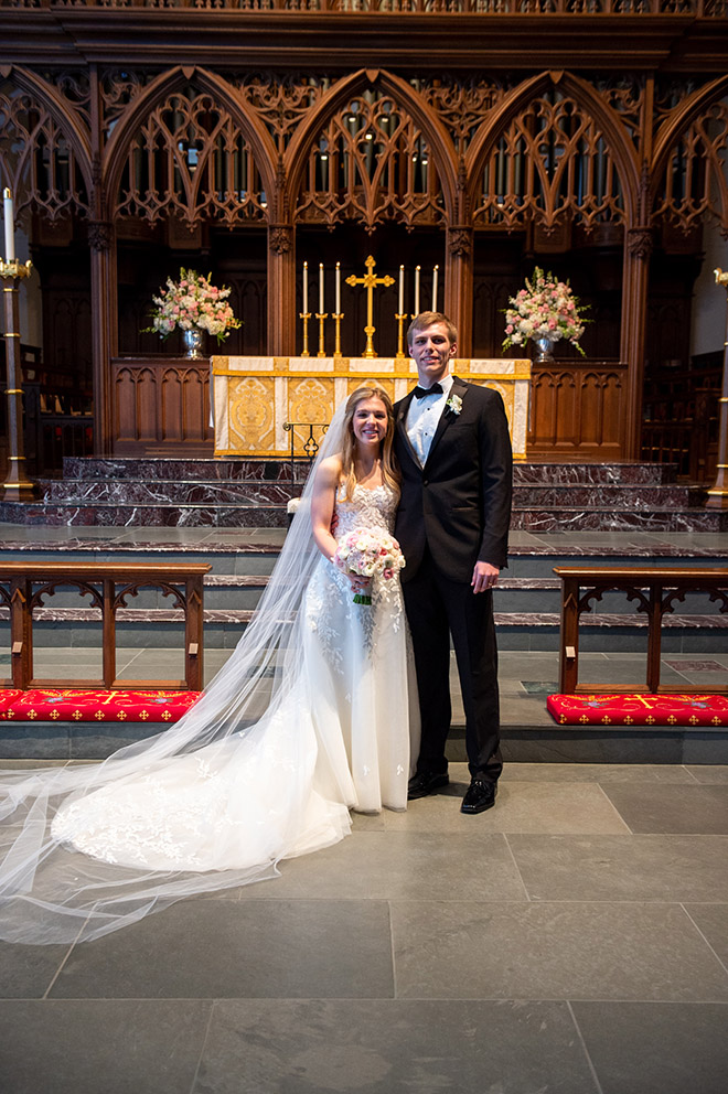 bride, groom, wedding photography, wedding photos, wedding photo ideas, couple's portrait, groomswear, black, bowtie, bridal bouquet, church ceremony