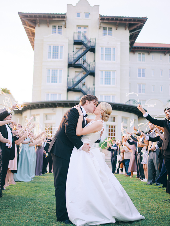 streamers, send off, bride, groom, grand exit, hotel galvez, daytime wedding