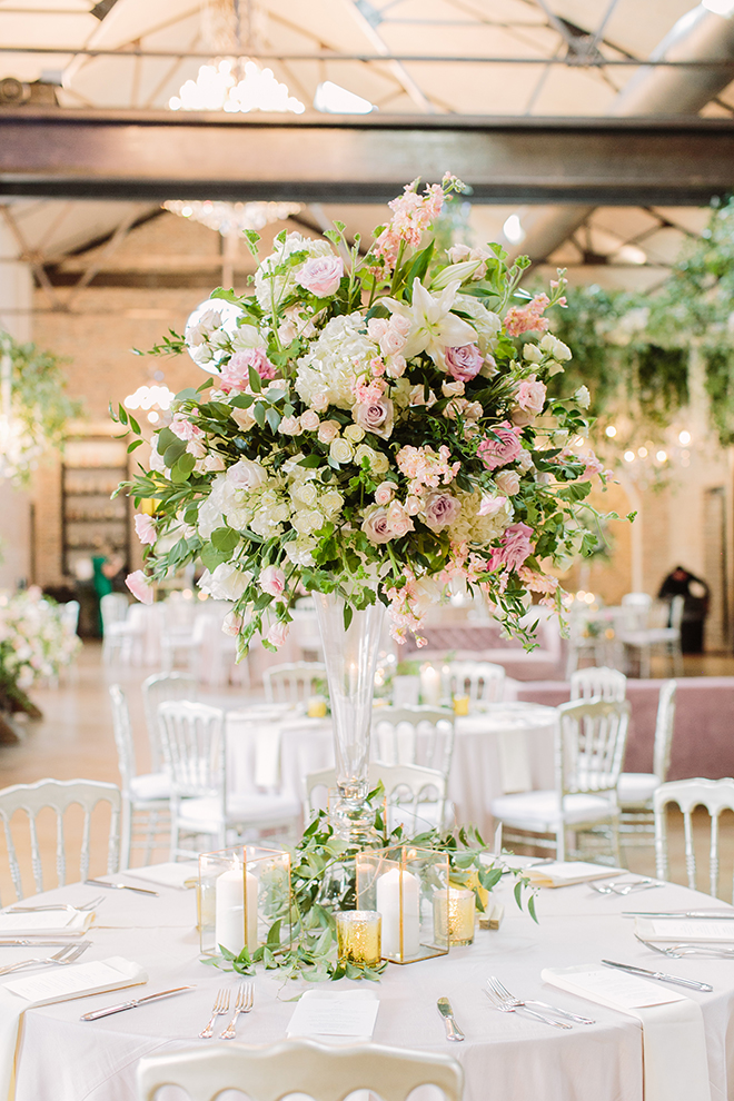 white roses, fairytale wedding, greenery, iron manor, plants n petals, plants n petals, reception decor, ceiling decor, flower garland, greenery garland, unique wedding decor, floral centerpiece, blush linens, wedding table, candles