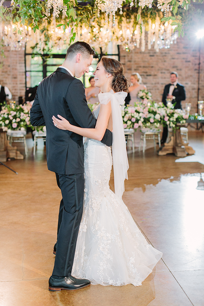 first dance, white roses, greenery, iron manor, plants n petals, plants n petals, reception decor, ceiling decor, hanging flowers, hanging greenery