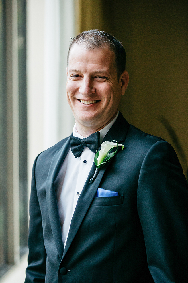 groom portrait, groom, groomswear, groom's suit, black, bow tie