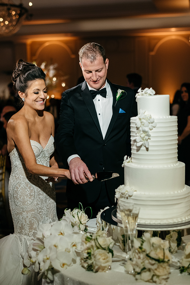 cutting the cake, susie's cakes, white, classic, elegant, orchids