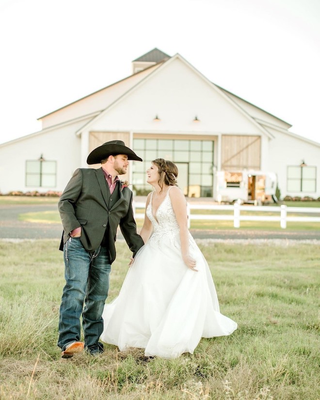 Rustic barn wedding with cowboy boots. 