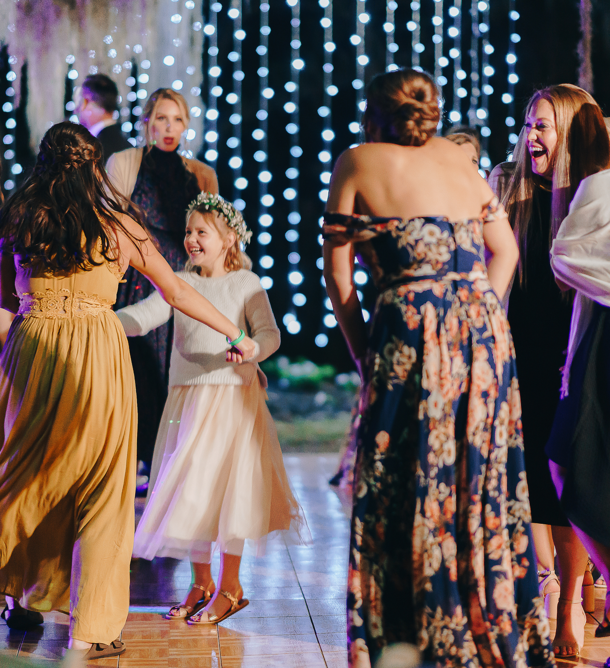 guests and little girl dancing at hill country wedding reception