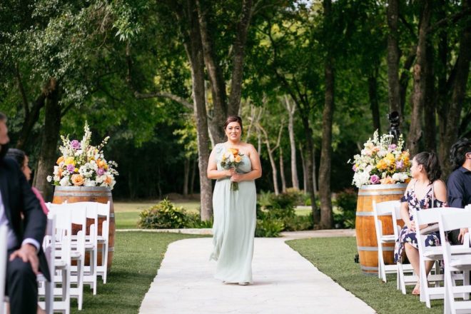 Multi-colored orange, white, and yellow flower arrangements. 