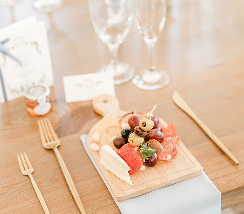 Personal charcuterie boards for the bride and groom's friendly spring wedding.