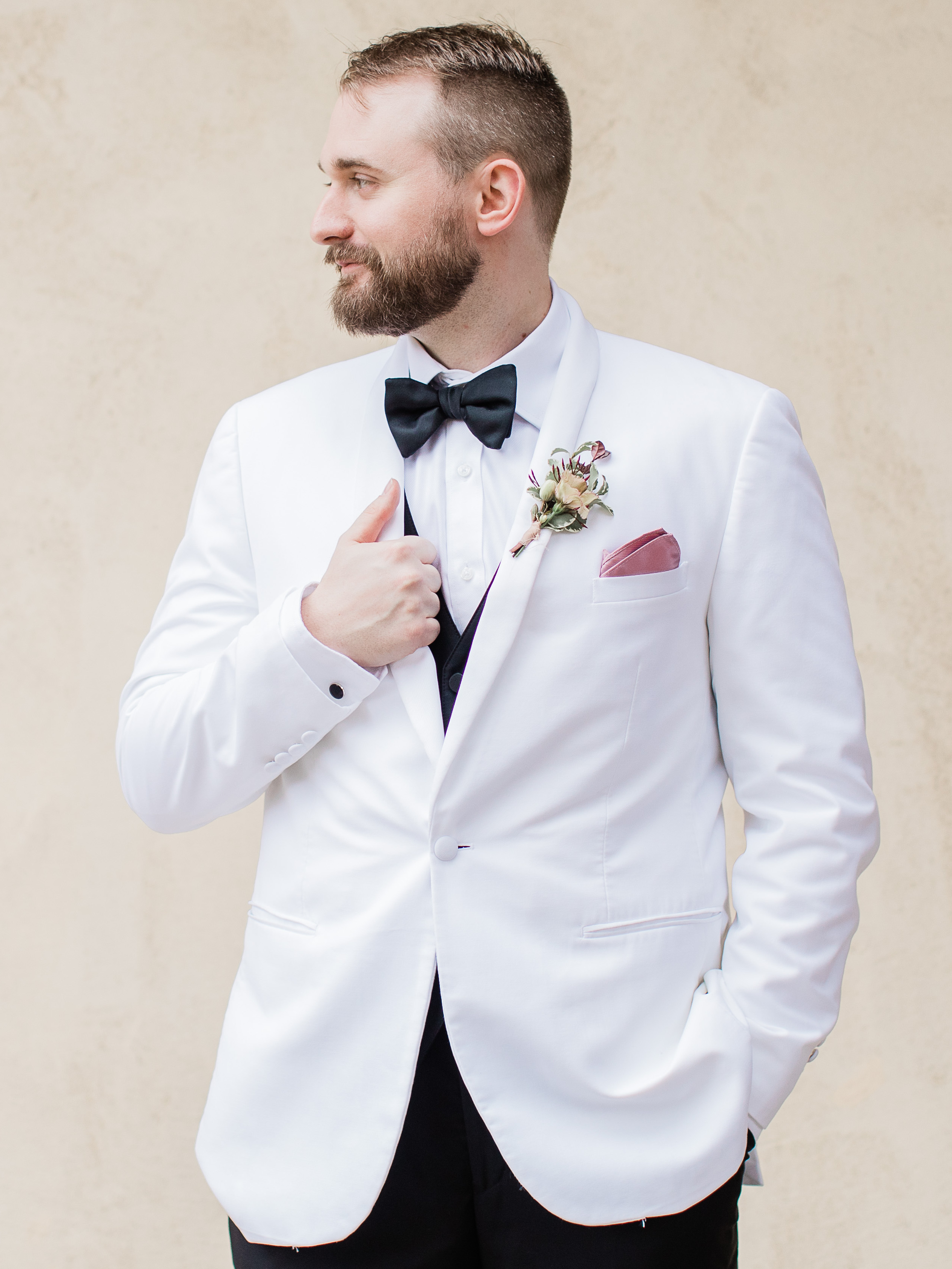 A photo of the groom, who is fluent in sign language, is ready to see his bride at their romantic al fresco winter wedding ceremony.