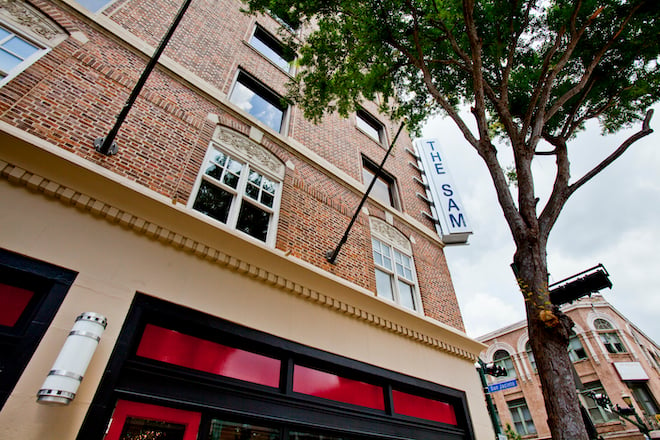 Modern brick exterior downtown venue, The Sam Houston Hotel.