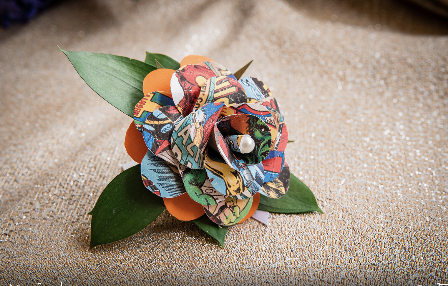 The groom's boutonnière is made out of Marvel comic book pages.