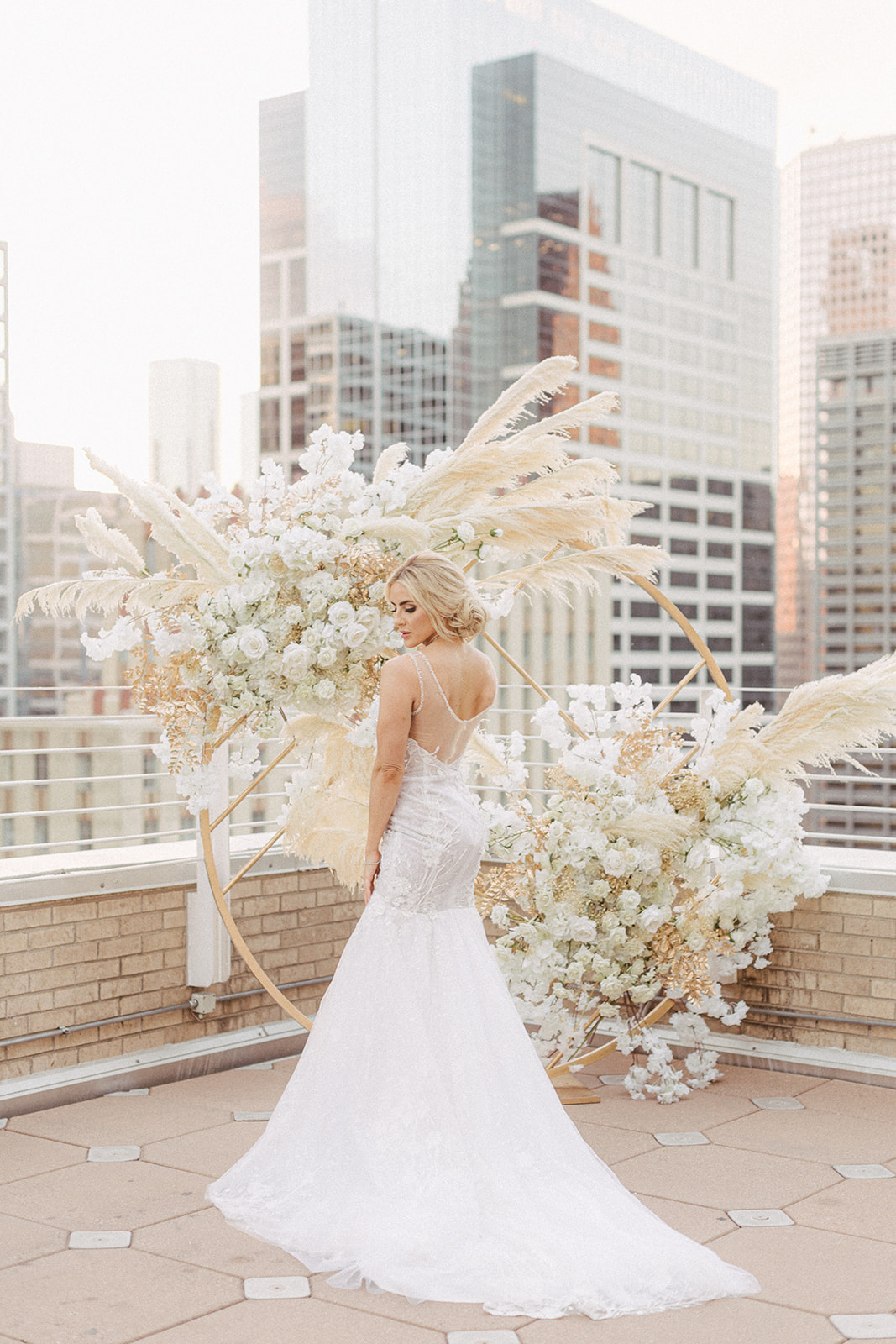 The bride poses on the rooftop of the Le Meridien Hotel in downtown Houston.