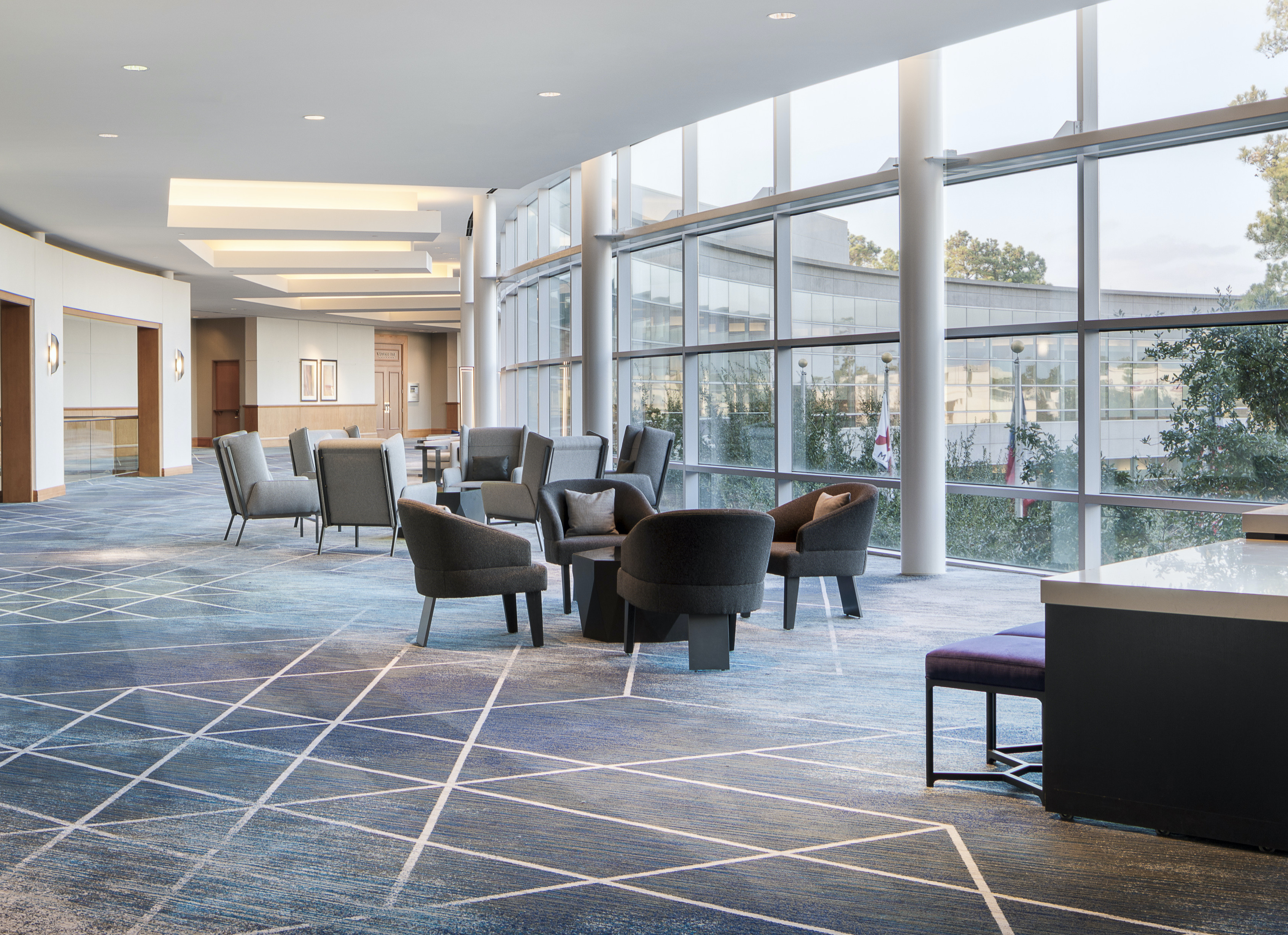 Pre-Function area with seating infront of the ballrooms at The Woodlands Waterway Marriott.