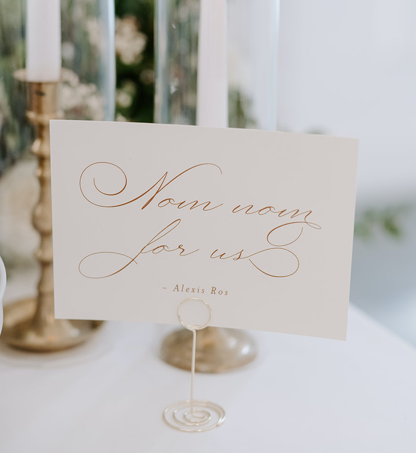 A Schitt's Creek inspired wedding card on the dessert table (AL)