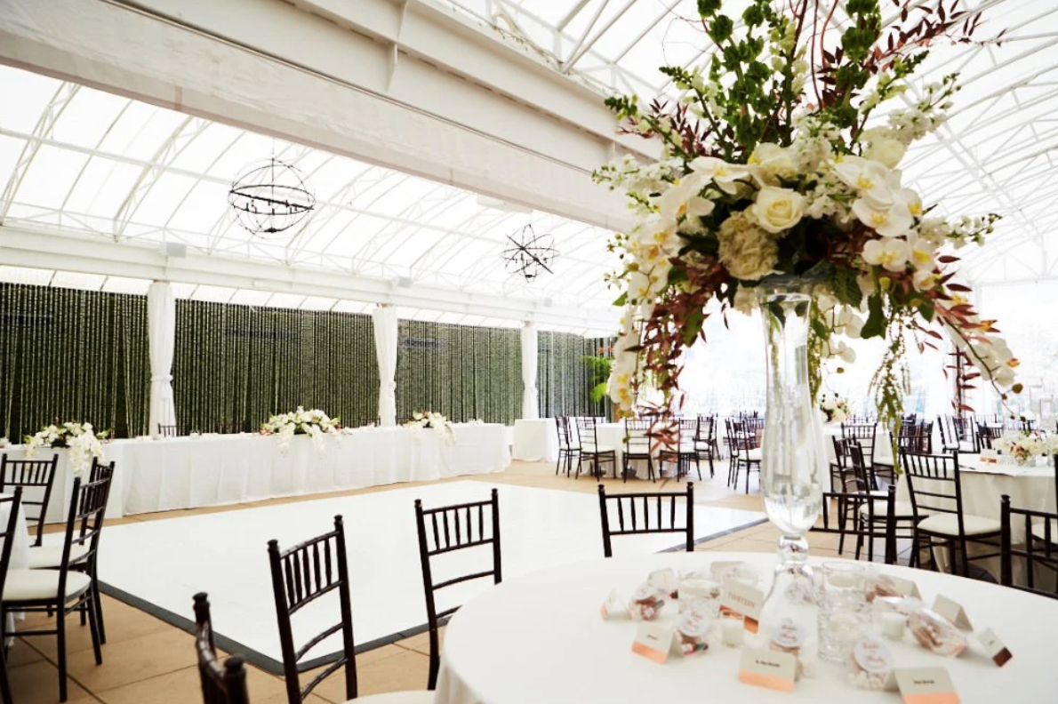 The Veranda in the Sam Houston Hotel is decorated for a hotel wedding reception.