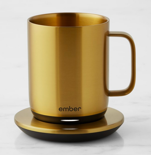 Battery operated and temperature controlled gold coffee mug by ember. 