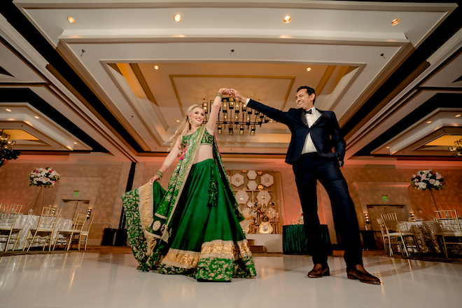 The bride and groom dancing before the reception begins. 