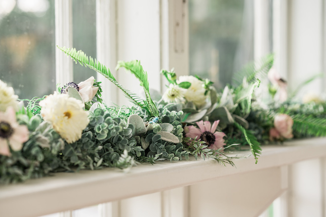 Flowers inside the chapel for the secret garden wedding editorial.