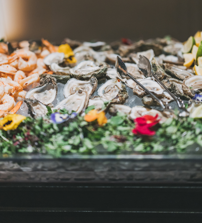 Oysters and shrimp at the "From the Bayou" food station at their ballroom reception.