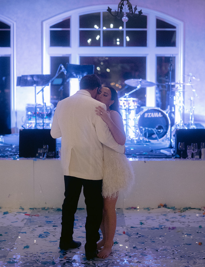 The bride and groom sharing a private last dance.