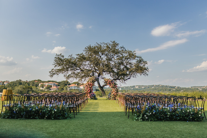 An alfresco ceremony setup for a wedding at Omni Barton Creek Resort & Spa.