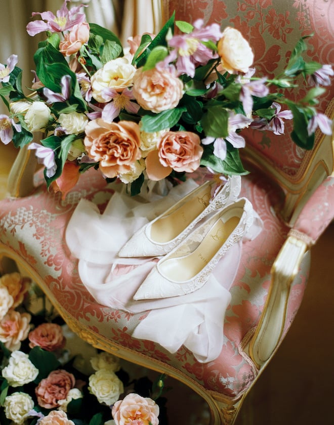 The bride's shoes and colorful bouquet for the Parisian love story editorial by Sean Thomas Photography.