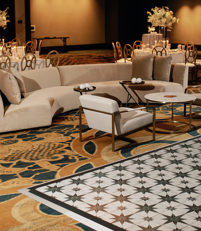 Couches and the dance floor in the reception area of the wedding in the San Antonio hill country.