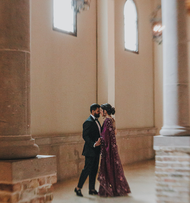 The bride and groom dancing during their engagement photos.