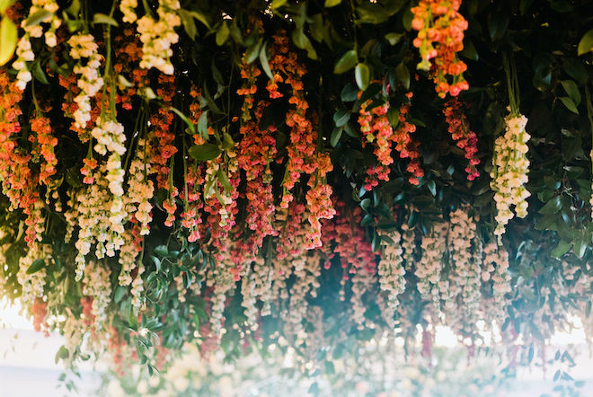 Wisteria-inspired florals for a French garden wedding.