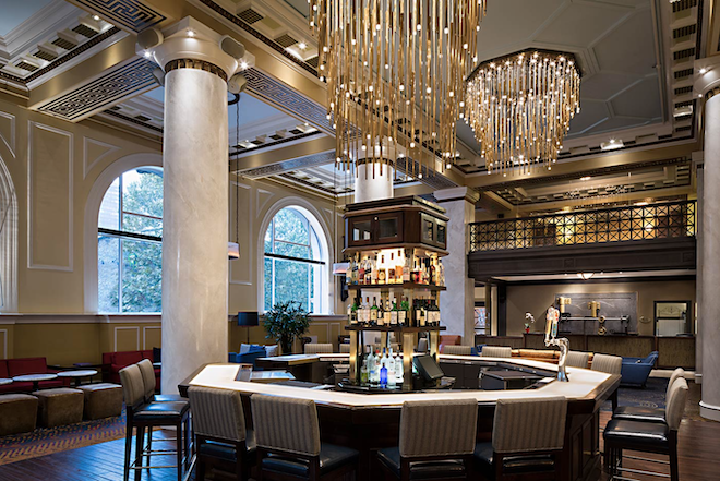 The bar in the Hotel Icon lobby, showing the 1911 Vault.